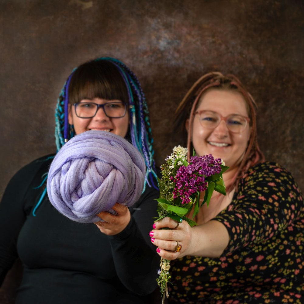 edina and kriszta holding flowers