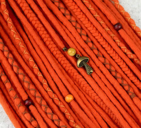 Orange wool dreads and braids