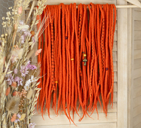 Orange wool dreads and braids