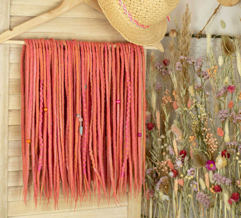 Rosy wool dreadlocks