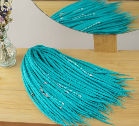 Turquoise wool dreadlocks